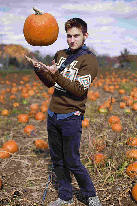 man catching pumpkin